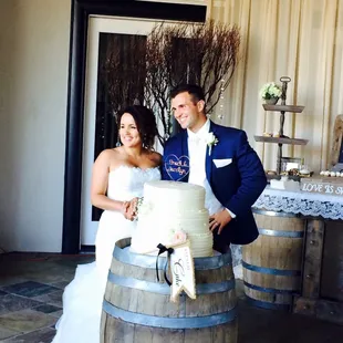 Our wine barrels are a great way to display the wedding cake