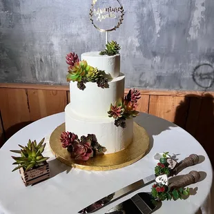 Our 3 tier Ube Cake with the top layer being Ube cheesecake. With buttercream frosting.
