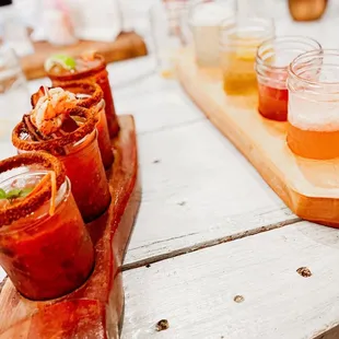 a variety of appetizers on a wooden board