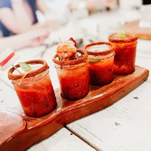 a tray of bloody cocktails