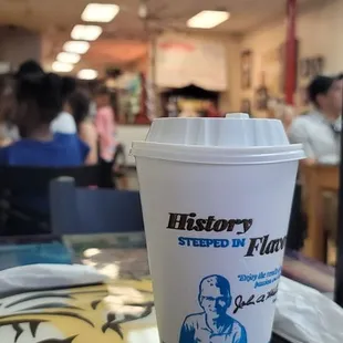 a cup of coffee on a table