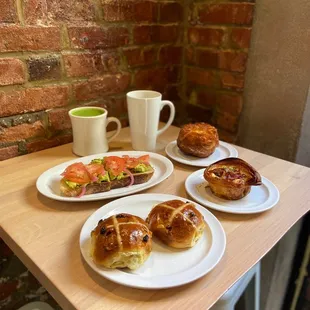 Hot Cross Buns, Baked Egg w/ Bacon, Avo Toast, Kouign Amann