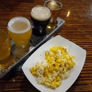 Beer Flight and complimentary popcorn