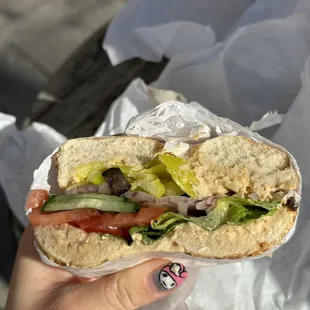 Veggie and hummus bagel
