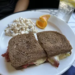 a sandwich and macaroni salad