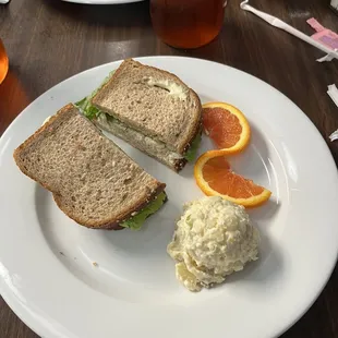 Tuna salad on wheat with potato salad