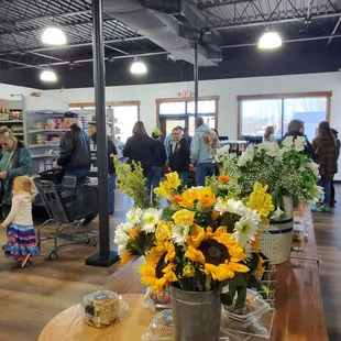 Inside by the deli looking at the front of the store