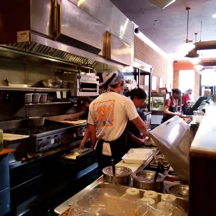 two men working in the kitchen