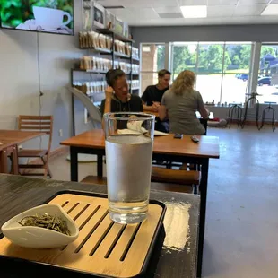 a glass of water and a plate of food