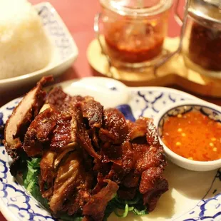 Perfectly crispy roast duck over a bed of sautéed spinach. $12.50