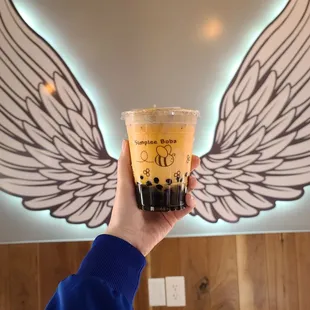 Thai tea with boba and Tiramisu foam, meh