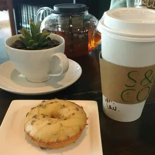 a donut and a cup of coffee