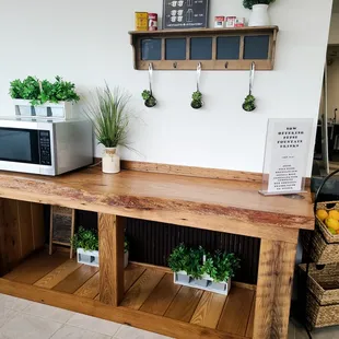 a kitchen with a microwave and a counter
