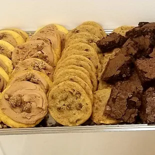 a tray of cookies and brownies