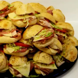 a plate of sandwiches