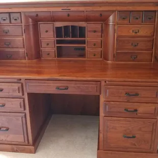 A roll top desk.