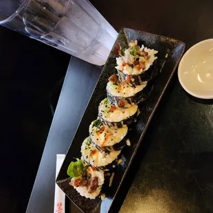 Lonestar roll. Taste like a big Mac rolled up in a sushi roll. Lol it was good