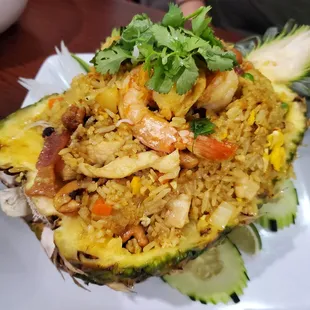 Pineapple Fried Rice - Curry Flavored, they have raisins in it! Pineapple chunks are big! 10/10.