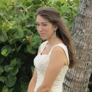 Gorgeous bride tying the knot in my yard, right on the beach!