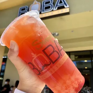strawberry lychee black tea with crystal boba