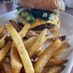 Cheeseburger -Pickle, Onion, Mustard, and Jalapeño side of fries.