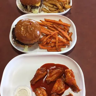 Cheeseburgers, sweet potato fries, and buffalo wings