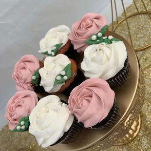 cupcakes with white and pink frosting