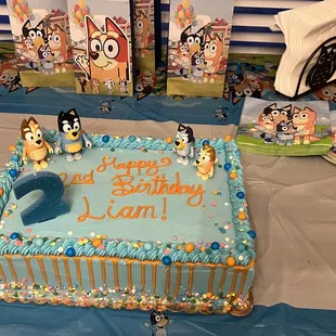 a birthday cake with cartoon characters