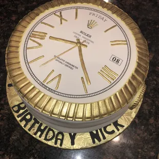 a cake with a clock on it