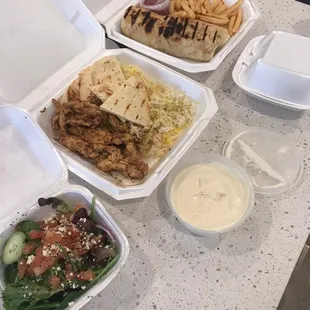 Chicken Shawarma Sandwich, Shawarma Chicken Platter and Greek Salad! Delicious best in Edmond. Make sure to get garlic sauce Amazing!