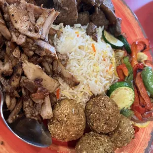 Lamb, chicken, rice, falafels, veggies.