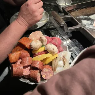 a plate of food being prepared