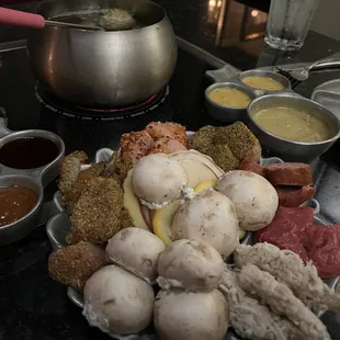 So much good!  Each of us chose 4 items, and they also include veggies, stuffed mushrooms and cheese ravioli!