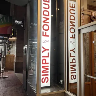 Street level sign on W. 4th Street