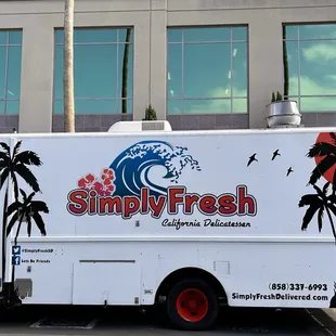 a food truck parked in front of a building