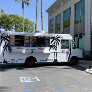 a food truck parked in front of a building