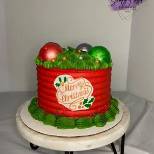 a christmas cake with ornaments