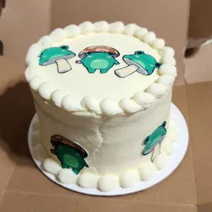 Frog/mushroom cake ordered for a birthday very satisfied with the way it turned out
