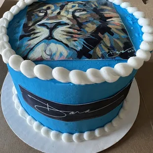 Top and side view of the cake with my artwork and signature on it.