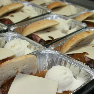 a tray of sandwiches with cheese and meat