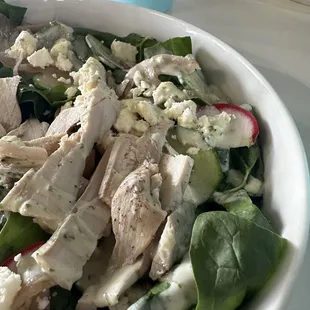 Spinach salad with chicken.
