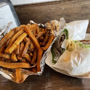 Gyro wrap and French fries.