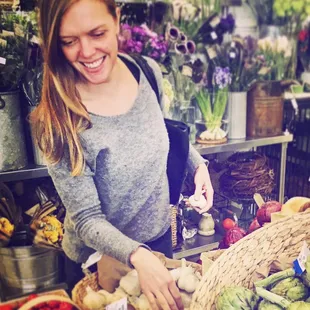 a woman in a flower shop