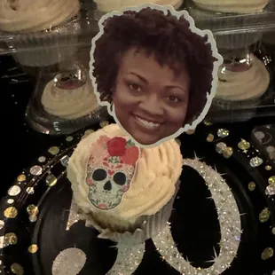 Almond cupcake with vanilla buttercream, and strawberry filling