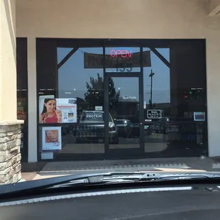 Store front is along 12 Bridges side of complex.