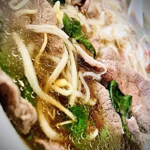 a close up of a bowl of soup