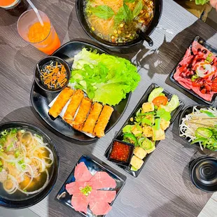 Orange soda, Thai Tea, Rare Steak Pho, House Special Pho, Eggrolls, and Fried Tofu -- Our completed feast!