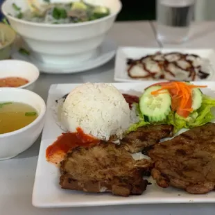 a plate of meat and rice