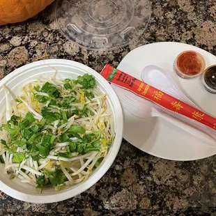 Pho Ga with fixins and cutlery, no broth.