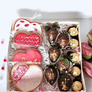 Valentine's gift set with 4 decorated designer sugar cookies with dark chocolate covered strawberries and Ferrero Rocher chocolates.